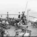 Norma sitting on the fantail with friends, aboard Nieuw Amsterdam, bound for Southampton.