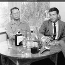 Jack and Earl Sears enjoy some scotch. Oakland, California c.1954-55.