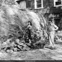 Norma and Manny Funk pitch in on the garden wall. Oakland, California c.1954-55.